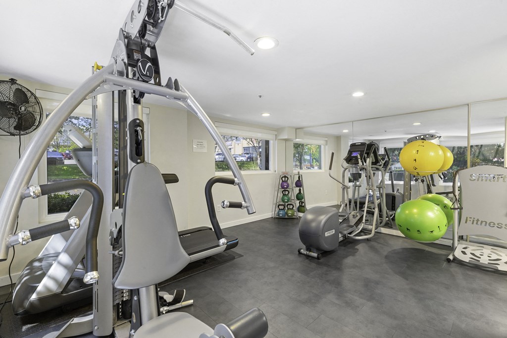 State-of-the-Art Fitness Center with a Variety of Exercise Equipment  State-of-the-Art Fitness Center with a Variety of Exercise Equipment at Sir Gallahad Apartment Homes, Washington, 98004